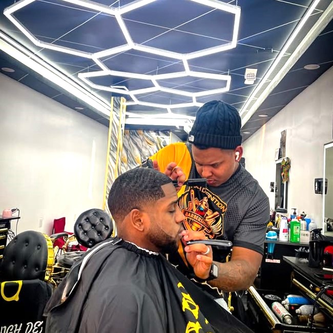 High definition norwalk barber with customer, side view