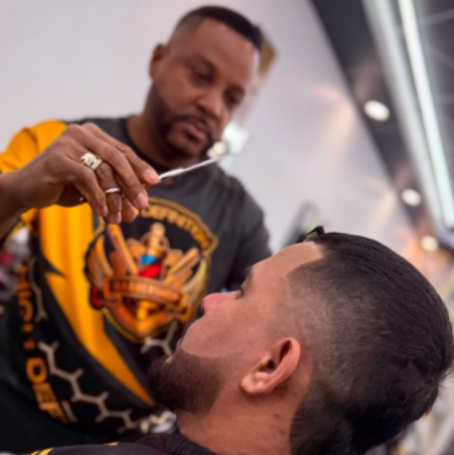 High definition norwalk barber with customer, side view